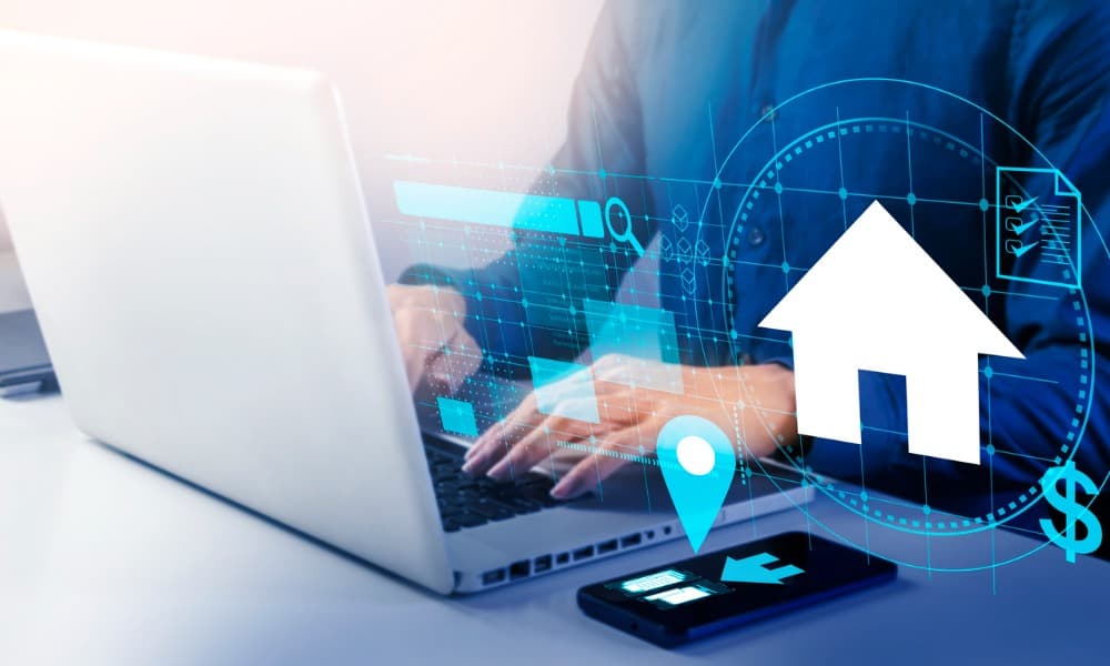 Person at a laptop content repurposing for real estate marketing